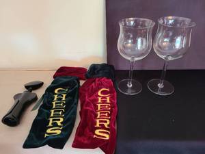 lot 1108 image: 2 large crystal wine glasses,  2 velvet wine bags, corkscrew