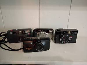 lot 1209 image: Various Cameras.  Minolta, Olympus and Konica
