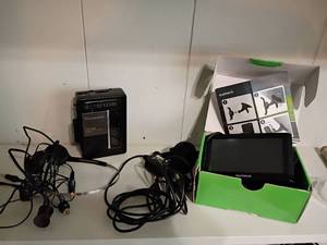 lot 1211 image: Garmin GPS Navigation System with Panasonic Radio Cassette Player
