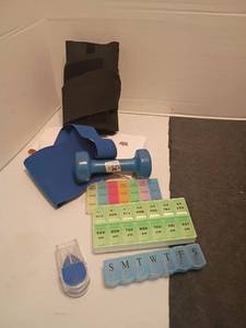 lot 1319 image: Braces, Pill Sorters and  3lb. weight