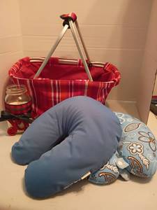 lot 1332 image: Basket with Neck Pillows and Candle