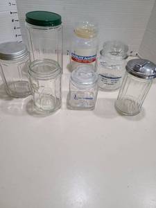 lot 1409 image: Jars and sugar dispenser.