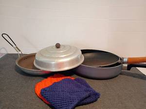 lot 1530 image: 3 Skillets with lid.  Nordic Ware and More