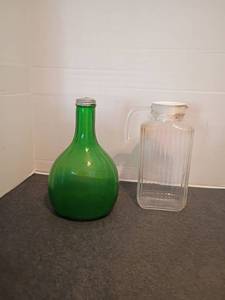 lot 1533 image: Green Glass Demijohn Bottle with Metal Cap and Glass Juice Pitcher