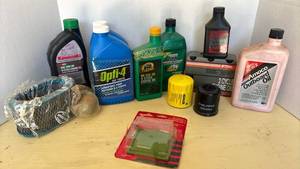 lot 4016 image: Small Engine Maintenance Kit - Motor Oil and Filters Bundle