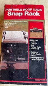 lot 4148 image: Portable Car Roof Rack Snap Back System with Elastic Straps