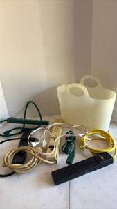 lot 4338 image: Mixed Power Strips Extension Cords and Storage Basket