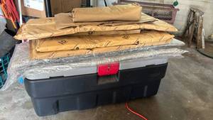 lot 4401 image: Rubbermaid  17x43x20 Container with Packing Materials.