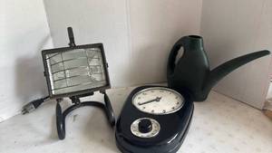 lot 4405 image: Work Light, Plastic Kitchen Clock Timer, and Watering Can