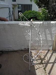 lot 5503 image: Wrought Iron Plant Stand, Curved.  Holds 5 plants.  47in. tall