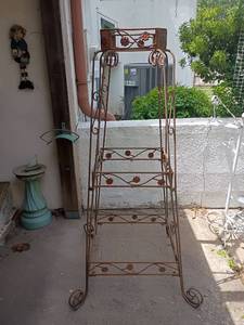lot 5504 image: Metal Stand.  Has places for shelves, needs wood or glass.  64 x 31 x 31