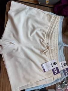 lot 579 image: Two pairs of sand wash shorts, size XXL