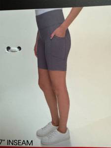 lot 580 image: Two pairs of DKNY bike short size extra small
