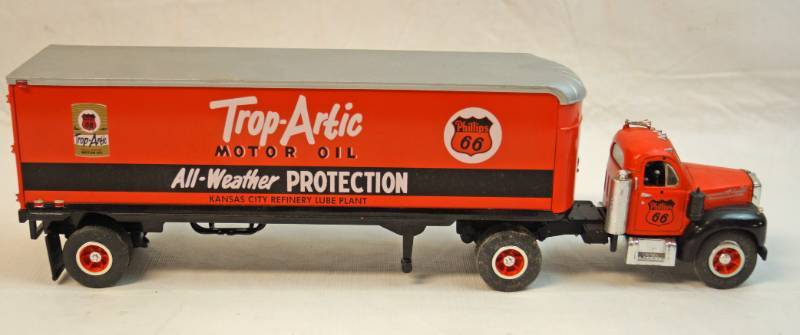lot 6260 image: First Gear 1960 Mack Truck Model B 61 Trop Artic Motor Oil Phillips 66 Semi truck -die cast model collectible -Kansas City ,Kansas on the mud flaps 164th scale -no box