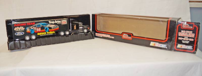 lot 6265 image: NASCAR Racing Champions-Phillips 66 Trop Artic- Matlock Trailers- 134th scale model Racing Team Transporter with die cast cab with opening rear door on trailer
