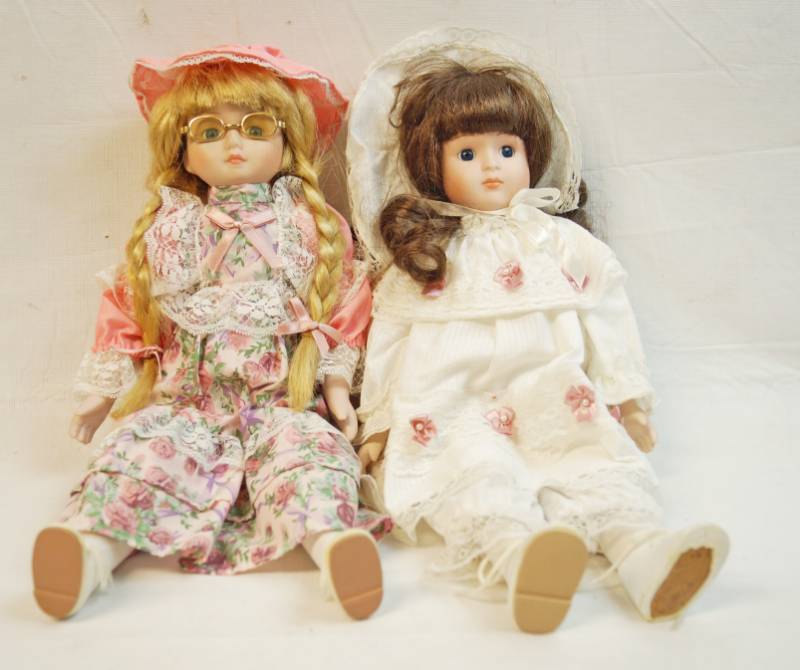 lot 6277 image: Two collectible porcelain dolls in Victorian outfits almost 16 inches tall- Waiting for you to give them a good home
