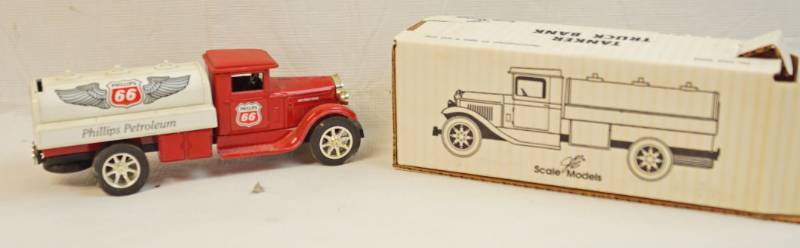 lot 6293 image: Joseph ERTL- Made in the USA-Die cast collectible -Phillips 66 Aviation Tanker Truck scale model-Locking coin Bank with key -in original box-GB 4040