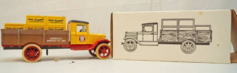lot 6317 image: ERTL collectible -Die Cast- 1931 Arm and Hammer-Hawkeye Crate Bank with key-in original box- Number 1 in a series-125th scale- 1990 -stock number 9229 Church and Dwight Company Inc.