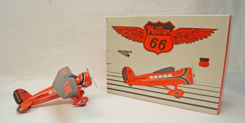 lot 6325 image: Lockheed Collectors Series -Phillips 66 Vintage Airplane Bank-NC898E-1st in a series -in original box-Spec Cast 1992-Stock number 35028