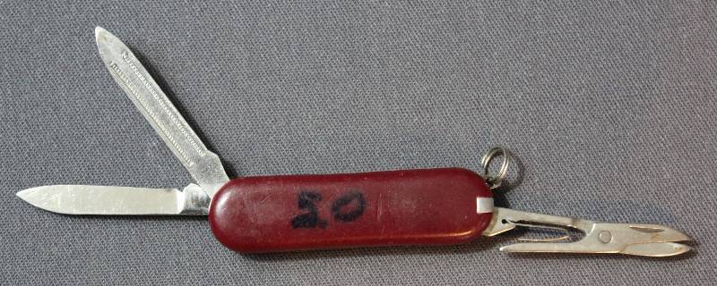 lot 9065 image: Vintage 2.25 Red Plastic Folding Multi-Tool Pocket Knife with Key Ring.