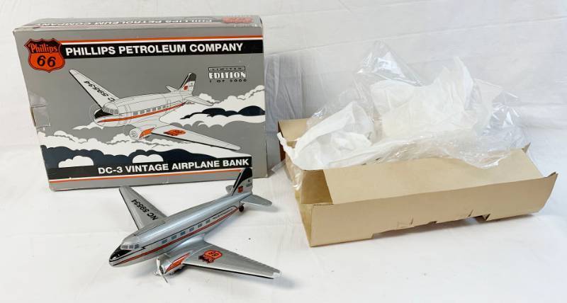 lot 8033 image: Phillips 66 - Limited Edition - 1 of 5000 - Die-Cast Metal - DC-3 Vintage Airplane Bank - Baked Enamel Finish - Pad Printed Graphics