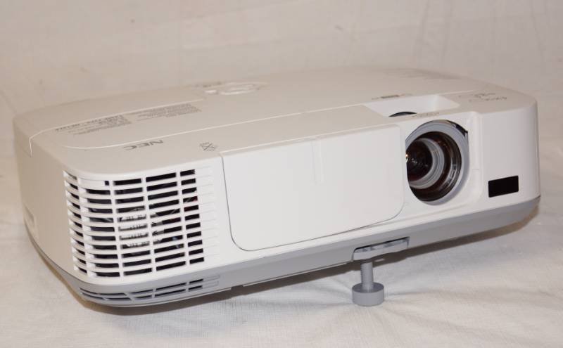 lot 5014 image: Projector - No cord or cables - See Pics - NEC M# NP-M300X - note powers on beeps 3 times and shuts down. Google says new bulb needed