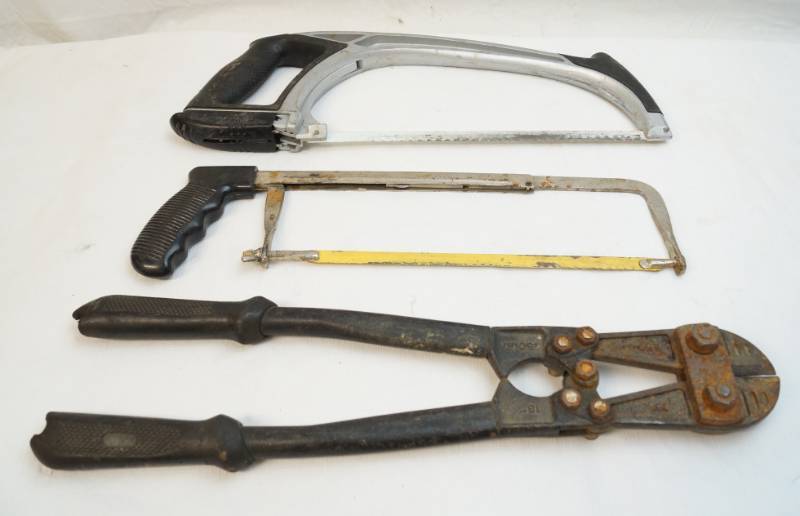 lot 5052 image: Lot of three hand tools-Two handsaws-one marked Stanley Fat Max-one set of bolt cutters-marked 18-450mm