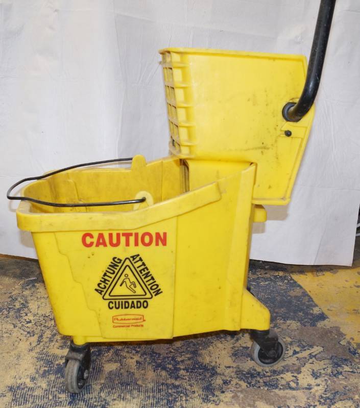 lot 6346 image: Rubbermaid yellow mop bucket on wheels-see pics for condition