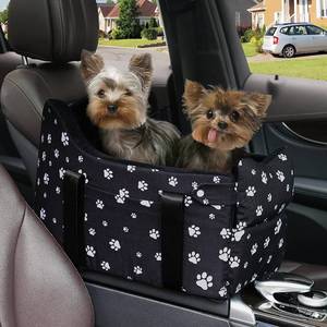 lot 3107 image: Dog Car Seat for Console - Memory Foam Pet Booster Seat for Small Medium Dogs Up to 21 lbs - SUV Truck Center Console Dog Seat with Safety Leash & Storage Pockets - Washable Cover (Large Black) - Retail $50