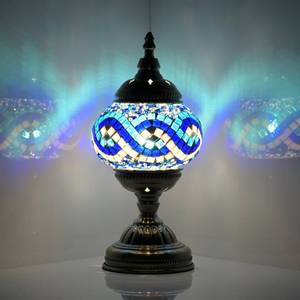 lot 3608 image: GOGERS Turkish Moroccan Table Lamp Lantern with Handmade Mosaic Glass Lampshade Tiffany Style Bohemian Stained Glass Decorative Desk Lamps Bedside Night Lights for Bedroom (White Multiple Blues) - Retail $39