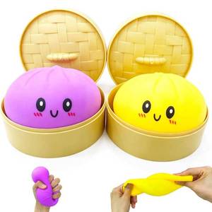 lot 3676 image: 2Pack Dumpling Squishies Toy with Steamer,Colorful Slow Rising Stress Ball,Stretchy Fidget Sensory Toy for Anxiety Relief,Perfect Easter Basket Stuffers for Kids and Adults(YellowPurple)&nbsp