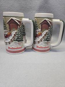 lot 477 image: Budweiser Holiday Christmas Beer Steins Set of 2