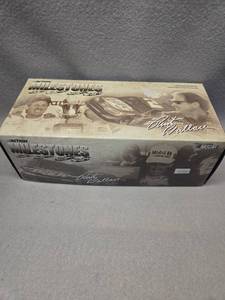 lot 482 image: Rusty Wallace #27 Milestones 1989 NASCAR Champion 2005 Charger Die-Cast Car