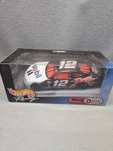 lot 483 image: Hot Wheels Racing NASCAR #12 Mobil 1 Diecast Car 124 Scale