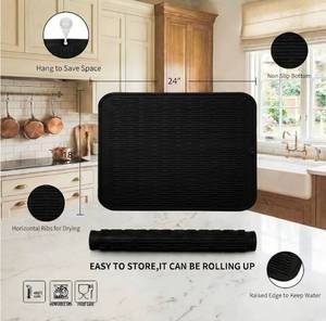 lot 27451 image: Silicone Dish Drying Mat for Multiple Usage,Easy clean,Eco-friendly,Heat-resistant Silicone Mat for Kitchen Counter or Sink,Refrigerator or Drawer Liner Black 2XL 24 inches x 18 inches - Retail $30