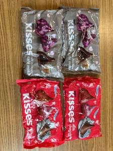 lot 6991 image: Four packages of assorted kisses