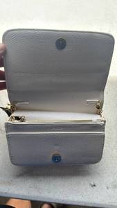 lot 8 image: BEBE white Pebbled Leather Crossbody Bag with Chain Strap