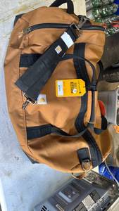 lot 33 image: Carhartt Brown Canvas Work pack with Black Straps 120liter