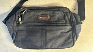 lot 38 image: Black Canvas Messenger Bag with Leather Patch Jaguar