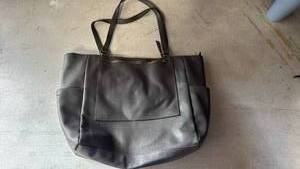 lot 43 image: Gray Leather Handbag with Front Zip Pocket