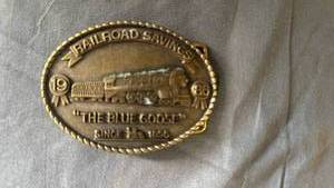 lot 101 image: Railroad Savings Commemorative belt buckle