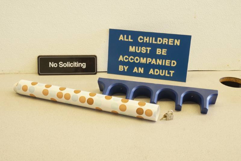 lot 1023 image: Business Signage, Wrapping Paper, Rack and more