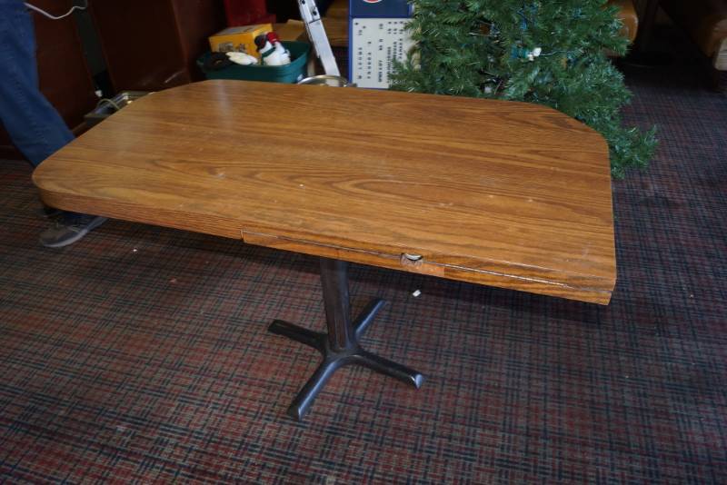 lot 1093 image: Restaurant Table with Heavy Base (Folds Down Hidden Extra Section)