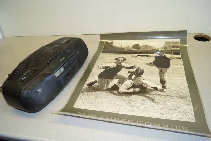 lot 1132 image: Sony Jambox and Three Stooges Poster