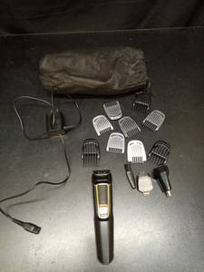 lot 1045 image: Philips Multi-Grooming Kit with Trimmer and Guard Combs - Retail $25