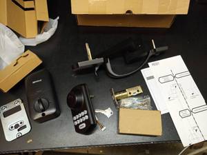 lot 1050 image: Revolo RE001 Electronic Keypad Deadbolt Lock Set with Door Handle - Retail $95