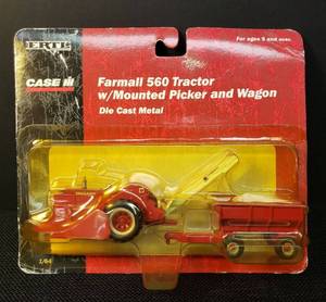 lot 2 image: Vintage 2001 ERTL - CASE IH Farmall 560 Tractor with Mounted PIcker and Wagon #14073 - Die-Cast Metal Toy 164 Scale - in Original Unopened Package