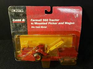 lot 3 image: Vintage 2001 ERTL - CASE IH Farmall 560 Tractor with Mounted PIcker and Wagon #14073 - Die-Cast Metal Toy 164 Scale - in Original Unopened Package