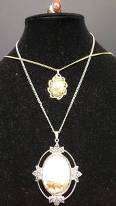 lot 6 image: Vintage Natural Stone Jewelry Large Oval Pendant on Silver Leaf Backing with 20in Chain, Oval Pendant on Gold Filigree Backing with 24in Chain, and Oval Stone Ring with Open Filigree Setting