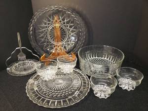 lot 10 image: VIntage Arcoroc Salad Serving Bowl 9in W x 4in T, 4 Crystal Footed SorbeBerry Bowls, Pineapple Pattern Serving Tray 12in W, Footed Cake Plate with Sunflower Design 11.5in W, and Pineaple Pattern Serving Dish with Removable Metal Hande & Fork